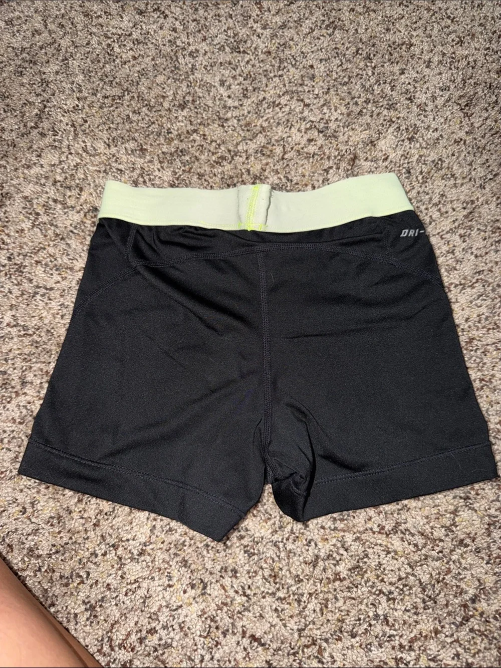 Nike Women's Black Athletic Shorts with Light Yellow Waistband